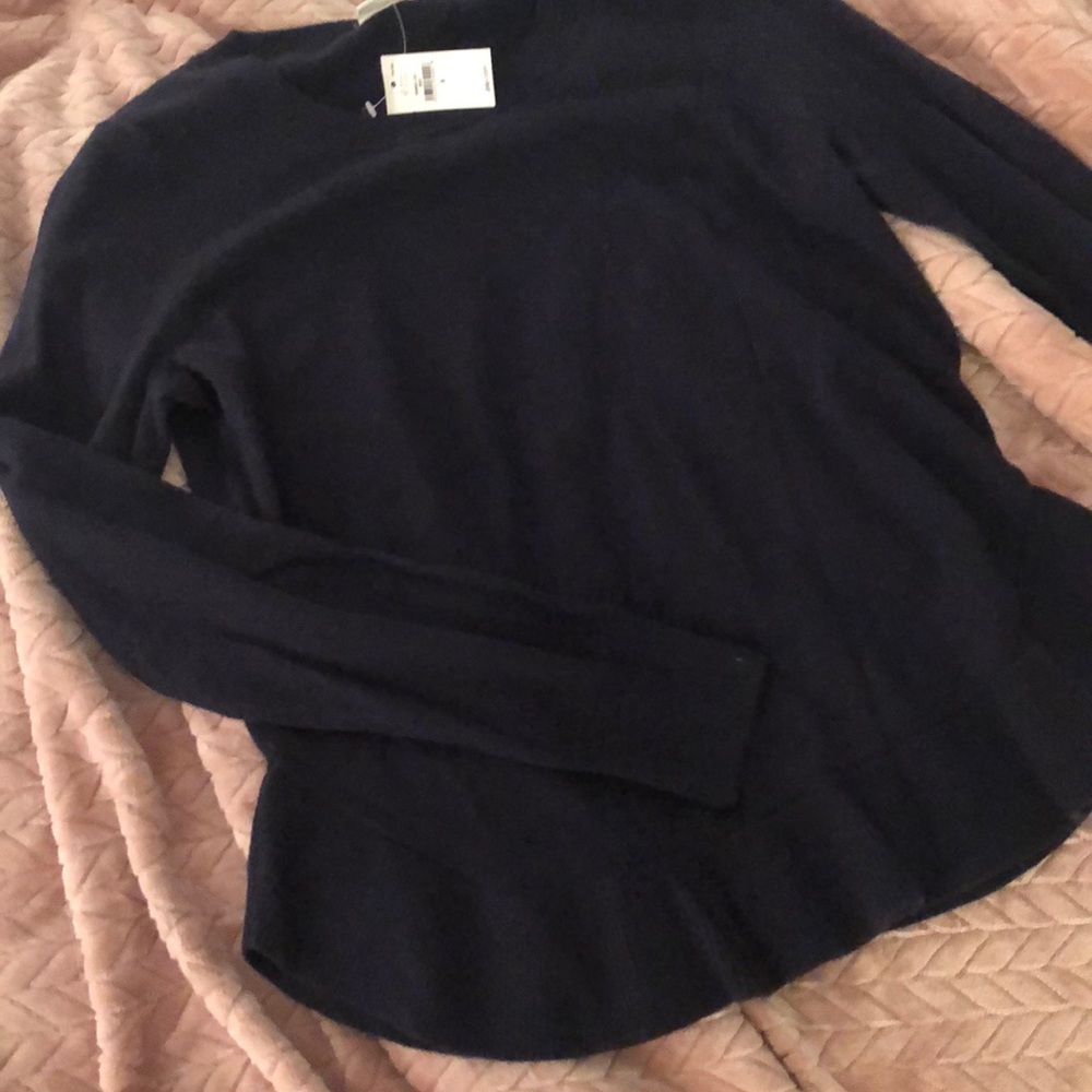 Navy sweater with ruffle hem